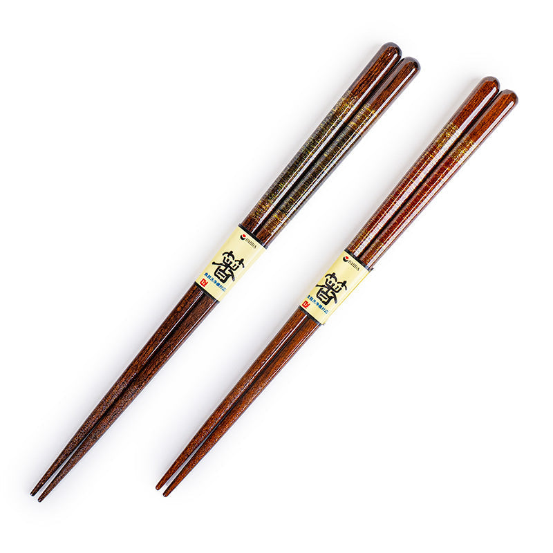 Estuche con 2 pares de palillos japoneses con detalles dorados