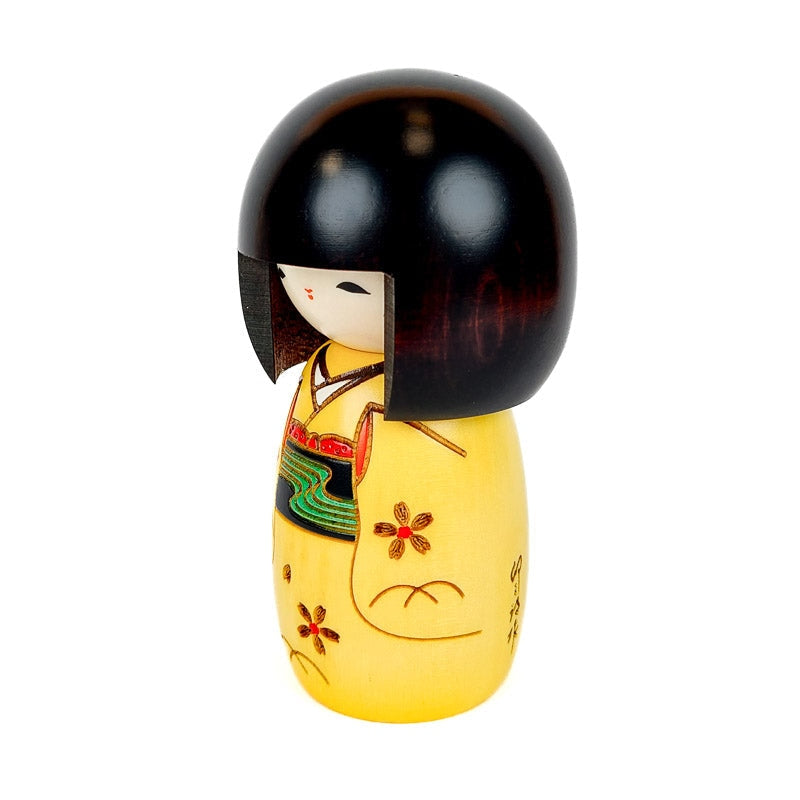 Muñeca Kokeshi amarilla