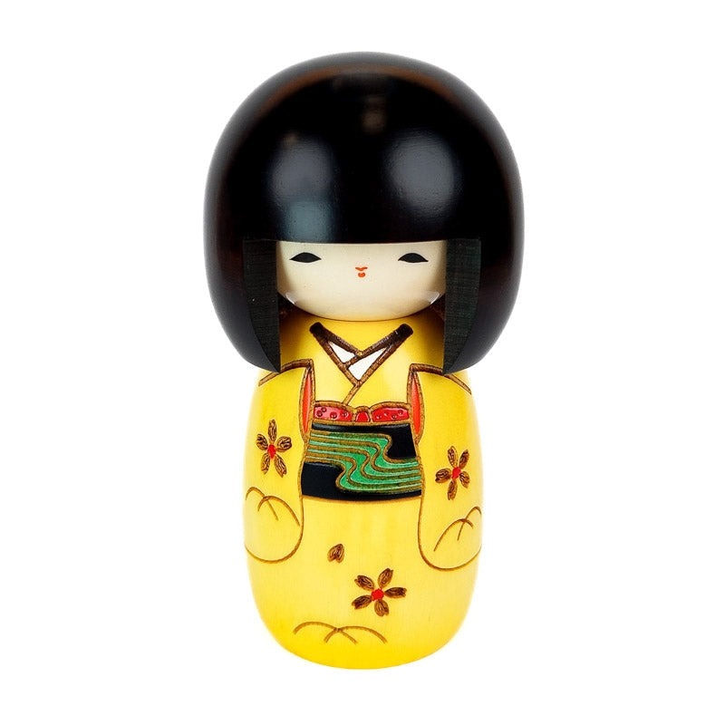 Muñeca Kokeshi amarilla