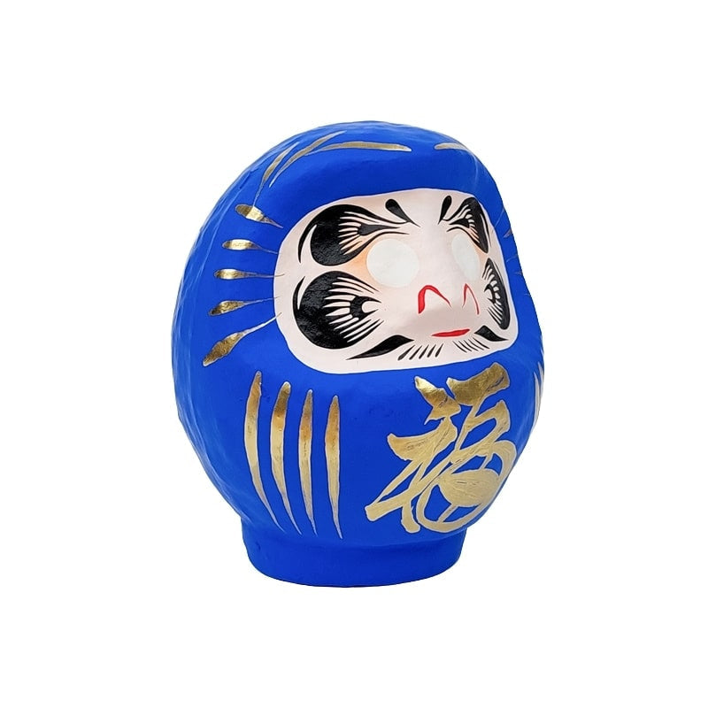 Daruma azul japonés