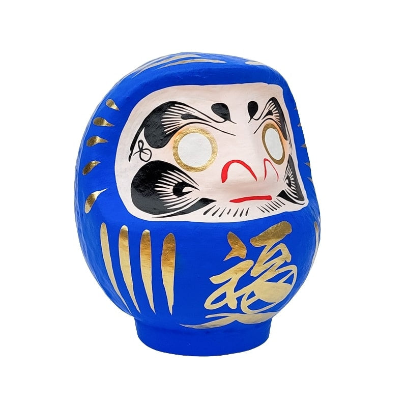 Daruma azul japonés