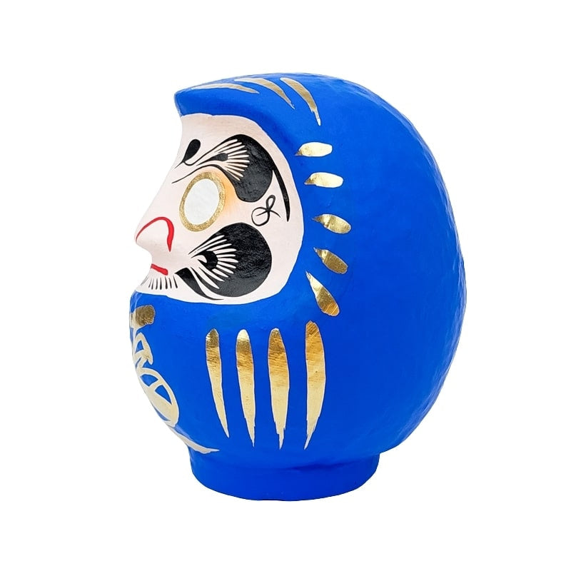 Daruma azul japonés