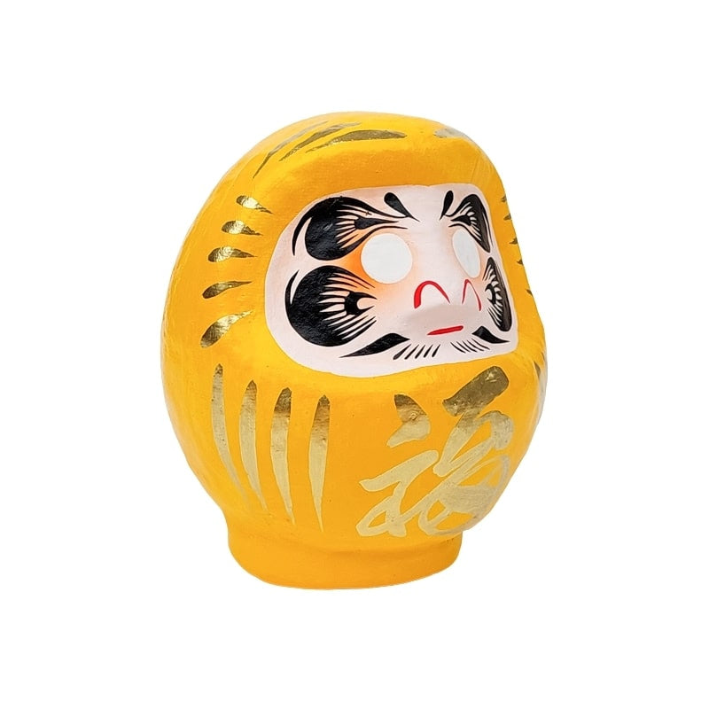 Daruma amarillo japonés