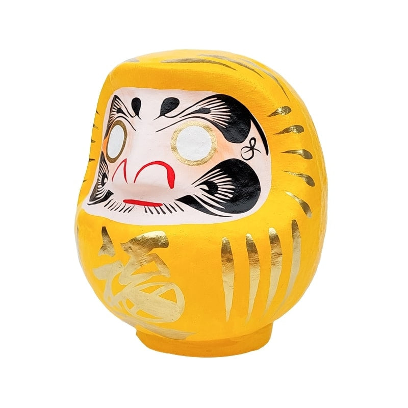 Daruma amarillo japonés