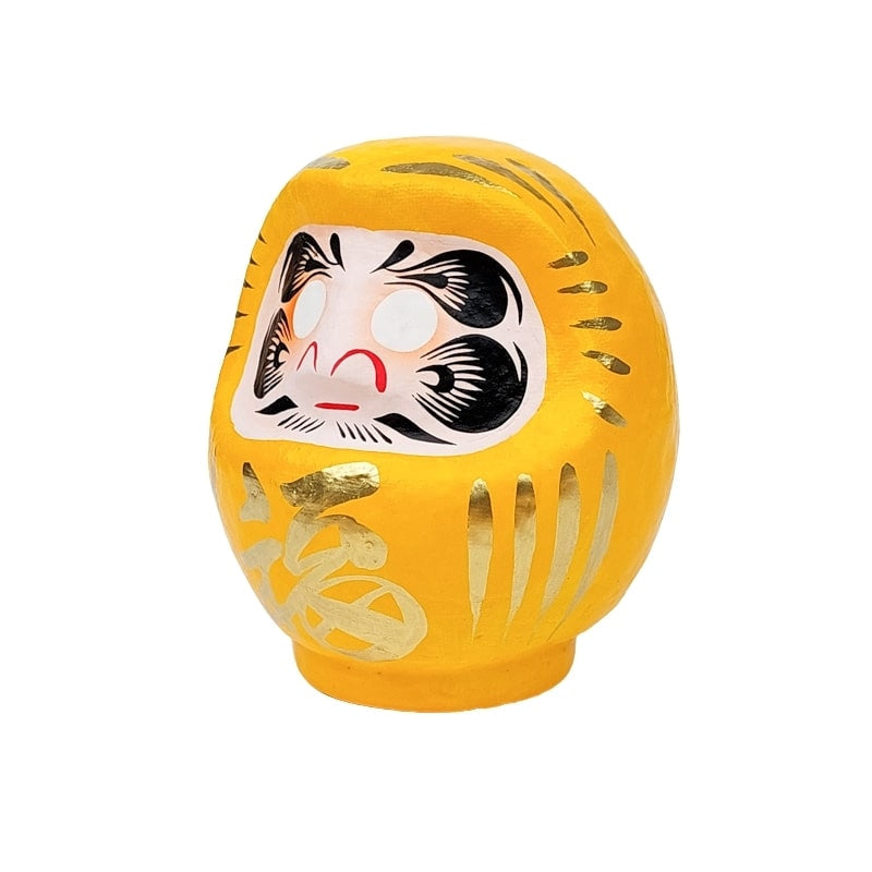 Daruma amarillo japonés