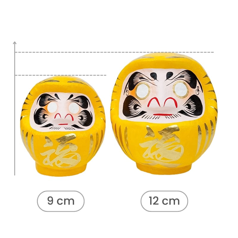 Daruma amarillo japonés