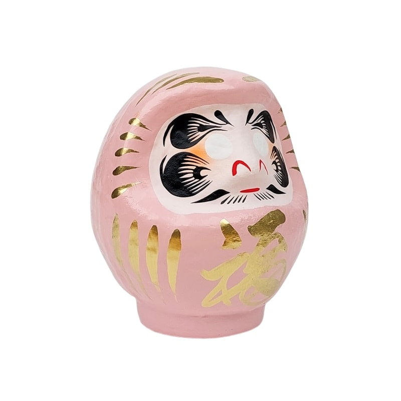 Daruma rosa japonés