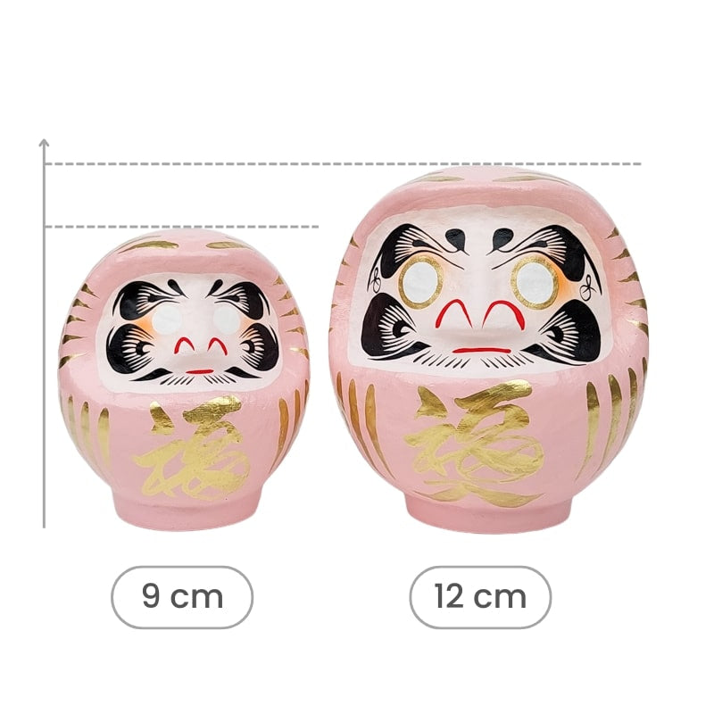 Daruma rosa japonés