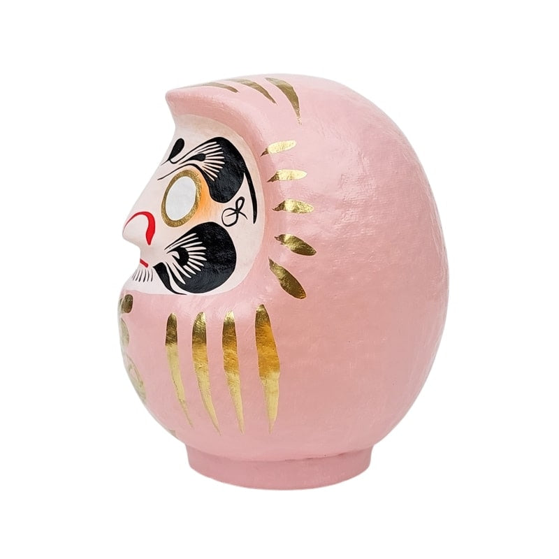 Daruma rosa japonés