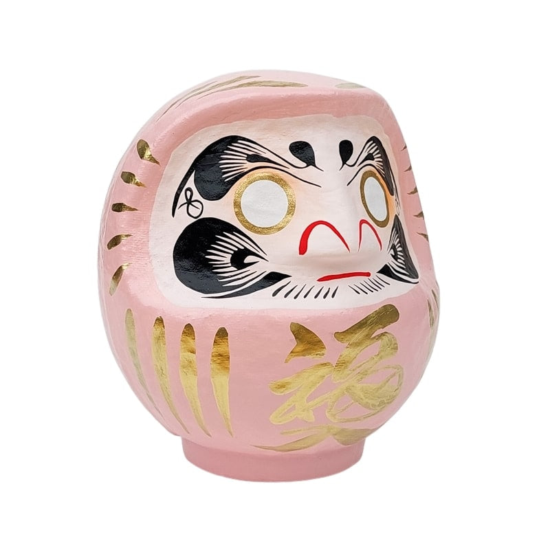 Daruma rosa japonés