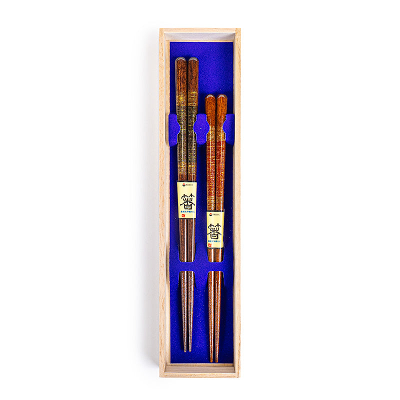 Estuche con 2 pares de palillos japoneses con detalles dorados