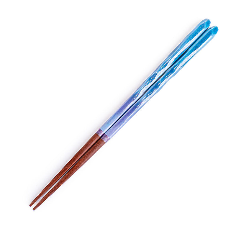 Palillos japoneses ondulados con purpurina azul