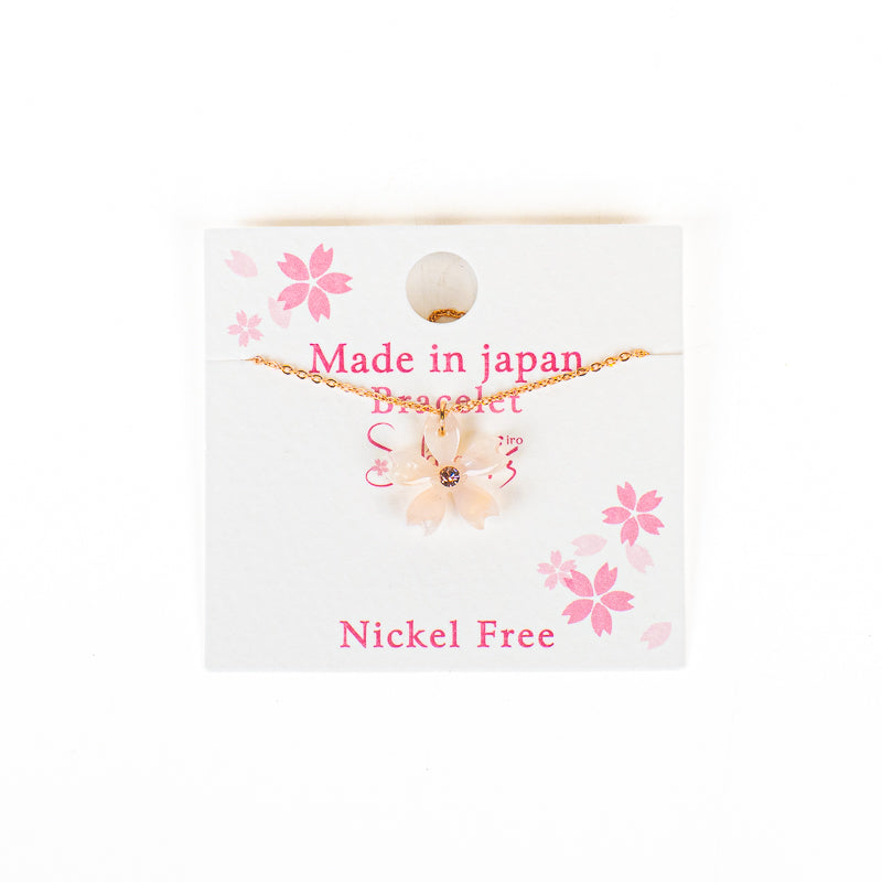 Pulsera japonesa con flor de sakura blanca